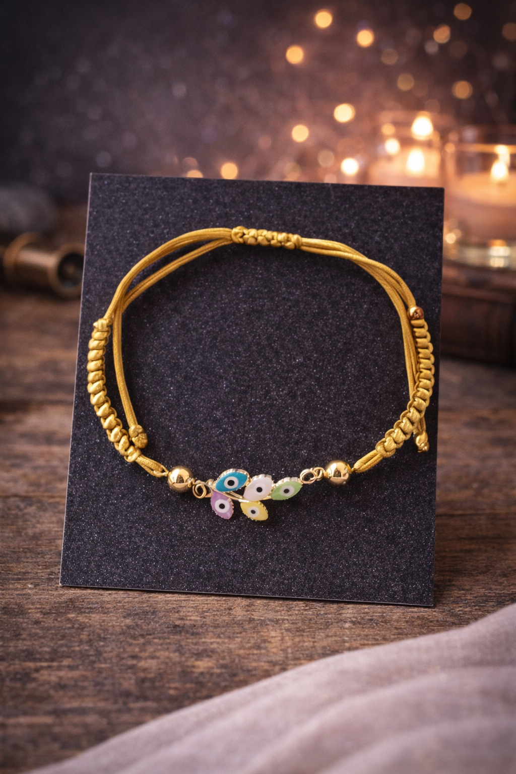 Bracelet doré mauvais œil en forme de fleur <small style="color:#666;"> Livraison gratuite </small>